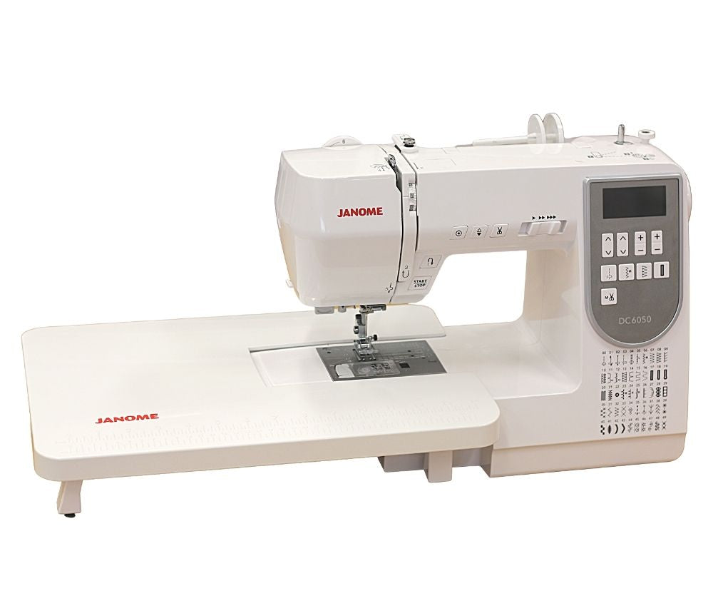 Janome DC6050 sewing machine with its extension table fitted