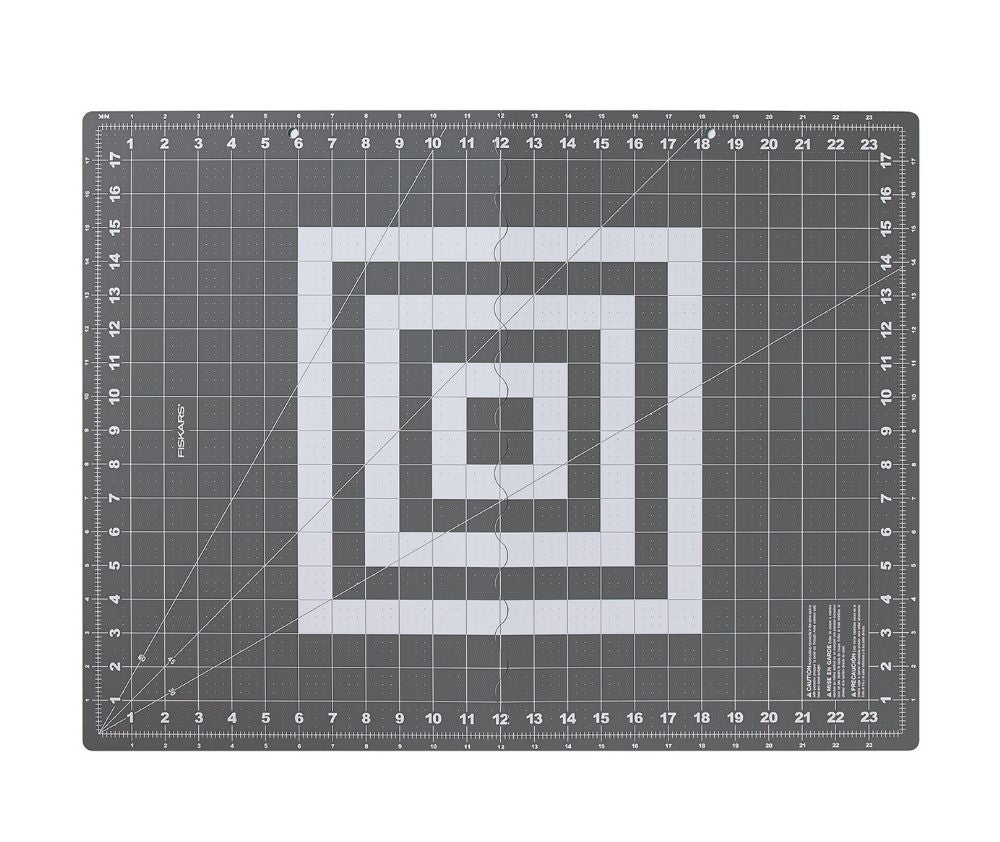 Fiskars_Folding_Cutting_Mat_with_Non-Slip_Base_(18_x_24)_2_SOHRZQYWFSVO.jpg